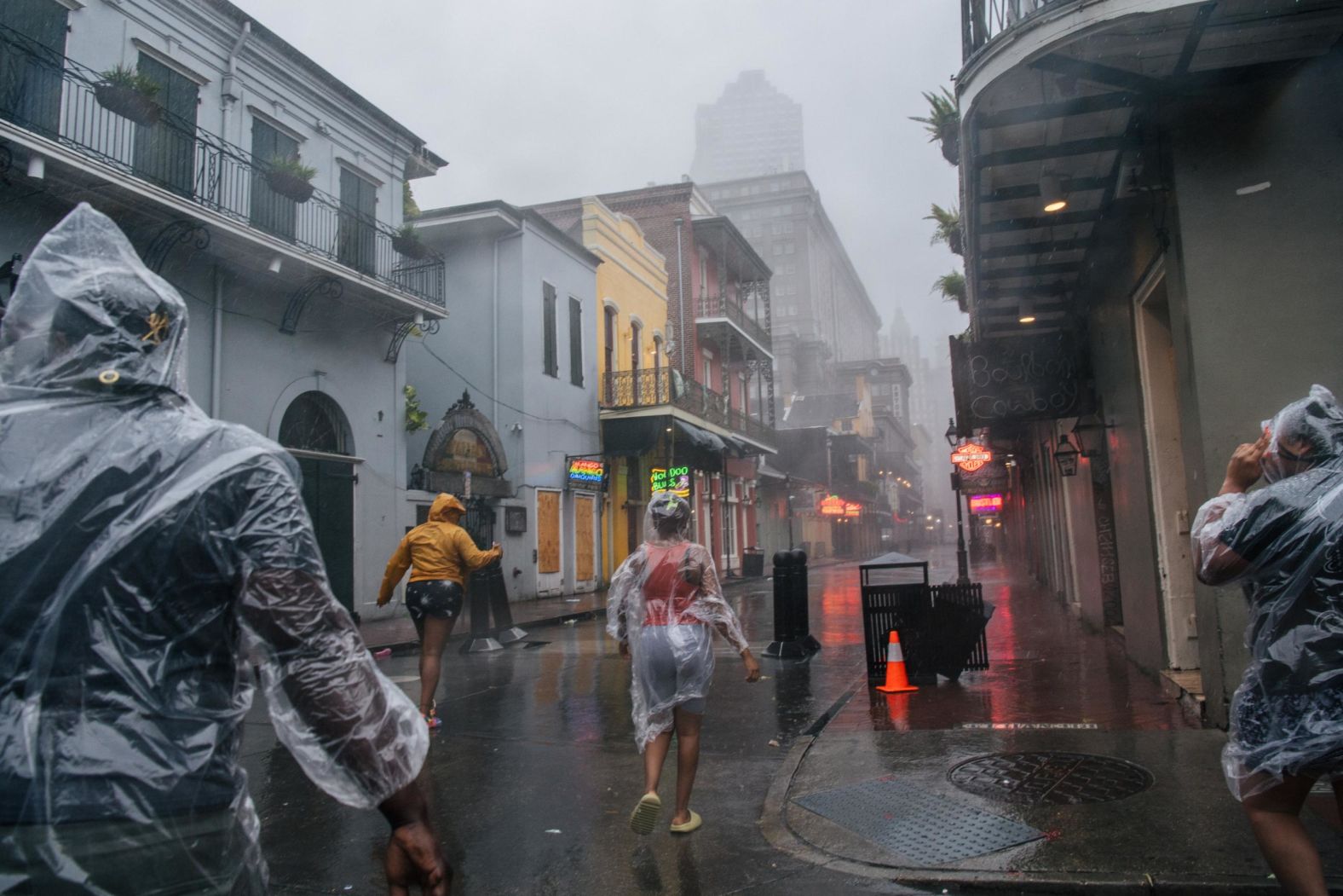 People walk through the French Quarter in New Orleans on August 29.