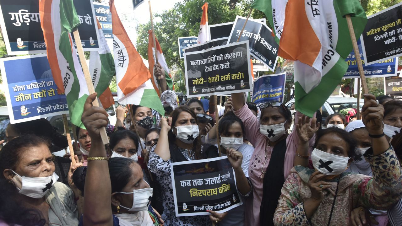 Protesters gather in New Delhi on August 3 to condemn the alleged rape and murder of a 9-year-old Dalit girl. 