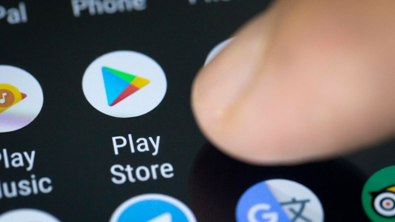 A Google Play store icon seen on a smartphone screen.