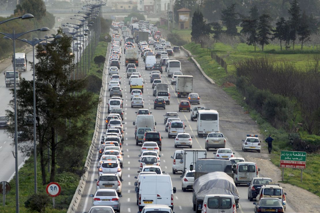 Cars drive on a road in the Algerian capital Algiers on February 1, 2017. 