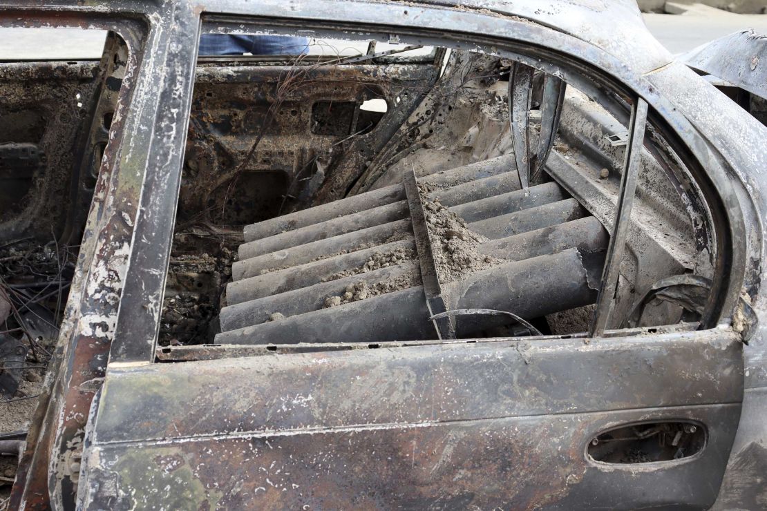 Rocket launcher tubes are seen inside a destroyed vehicle in Kabul, Afghanistan, Monday, Aug. 30, 2021. 