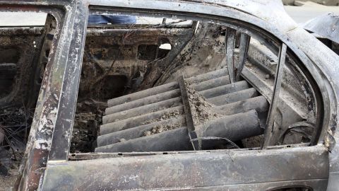 Rocket launcher tubes are seen inside a destroyed vehicle in Kabul, Afghanistan, Monday, Aug. 30, 2021.