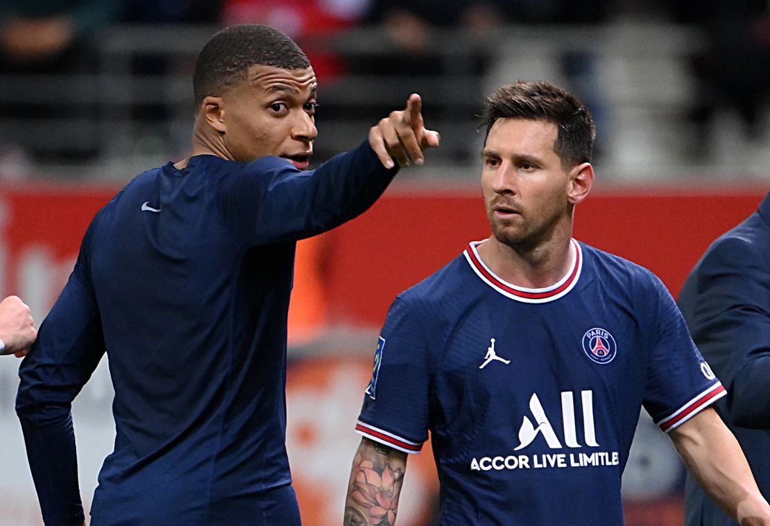 Kylian Mbappé talks to Lionel Messi after the final whistle.