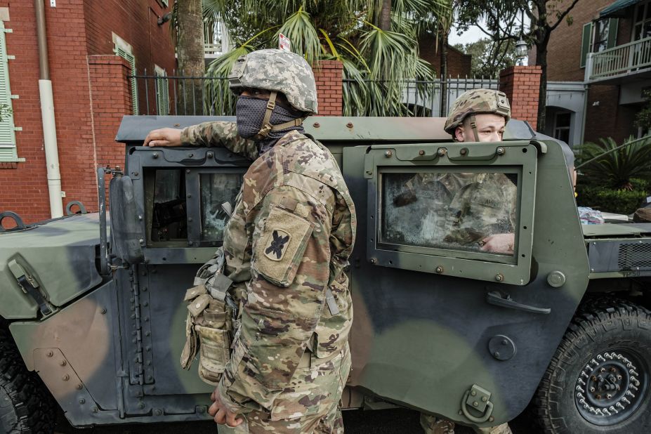 Members of the Louisiana National Guard help with recovery efforts in New Orleans on August 30.