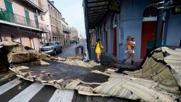 A section of roof that was blown off of a building in the French Quarter by Hurricane Ida winds blocks an intersection, Monday, Aug. 30, 2021, in New Orleans.
