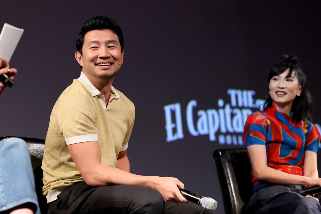 (L-R) Simu Liu and Meng'er Zhang speak onstage at the Los Angeles VIP Gold Open Premiere and Q&A of Marvel Studios' "Shang-Chi and the Legend of the Ten Rings" trailer at El Capitan Theatre on August 23, 2021.
