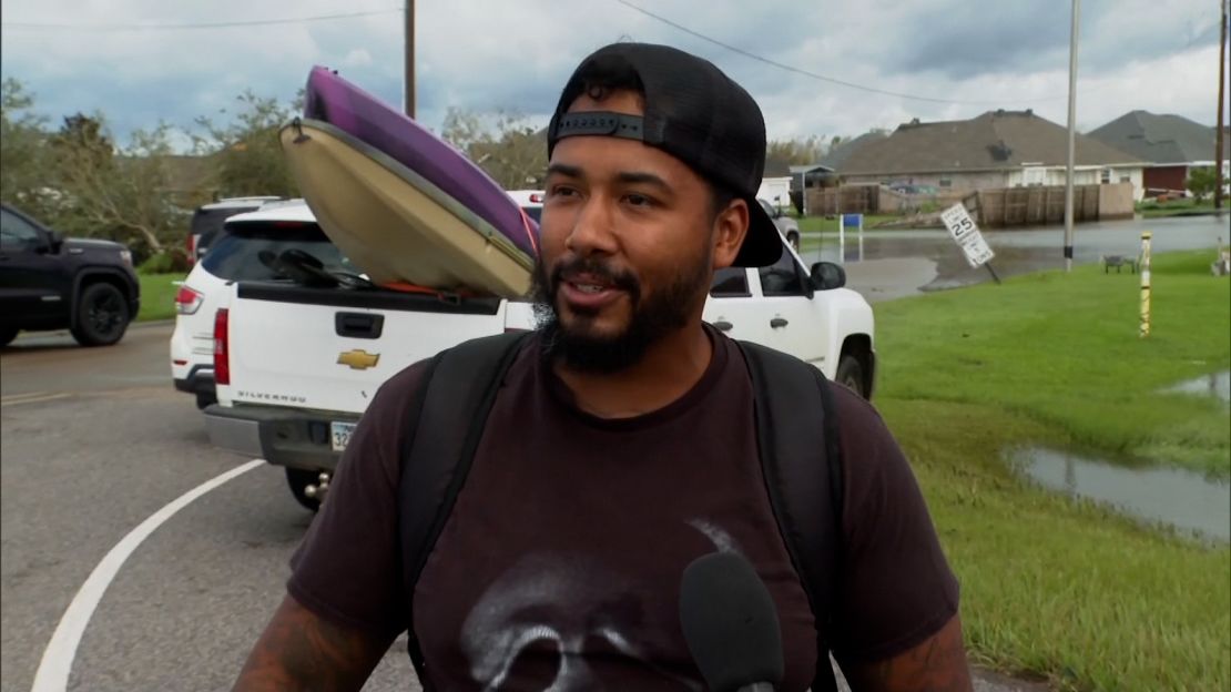 Gavin Goins Jr. told CNN he had to retreat to his attic as the waters from Hurricane Ida kept rising in his one-story house. 