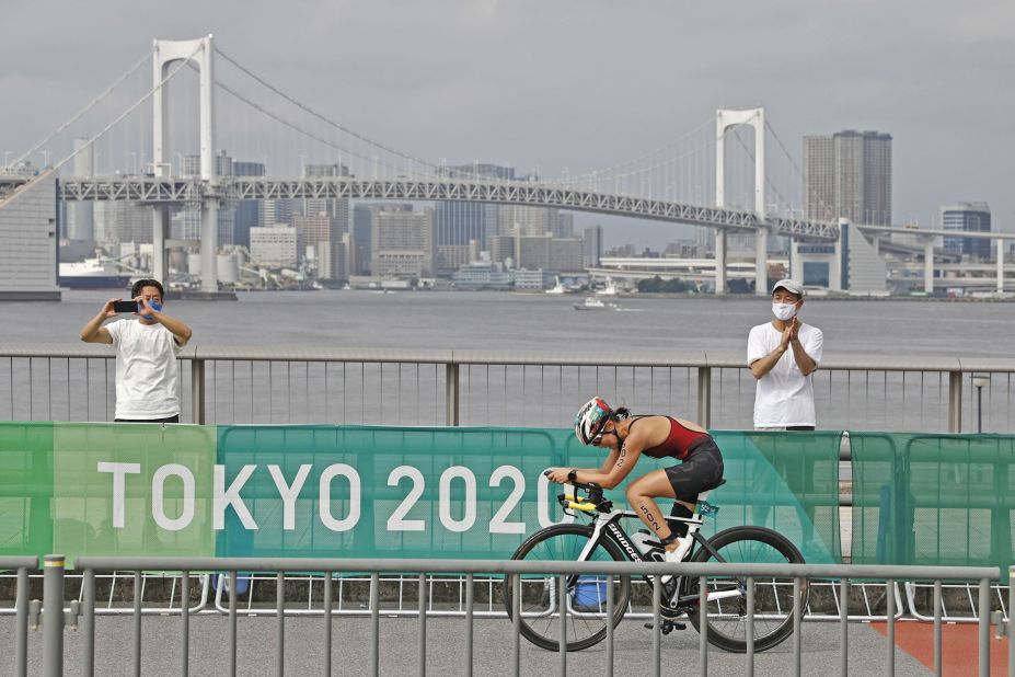 Japan's Mami Tani competes in the bike leg of the triathlon on August 29.
