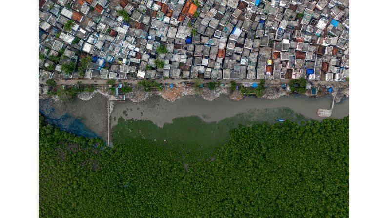 Mangrove swamps provide a buffer between Kakinada city and the sea in Andhra Pradesh, India, as shot by Indian photographer Rakesh Pulapa. 