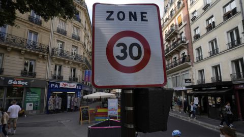 A speed limit road sign is pictured in a street, Monday, Aug. 30, 2021 in Paris as the speed limit on nearly all streets of the French capital is just 30 kph (less than 19 mph). 