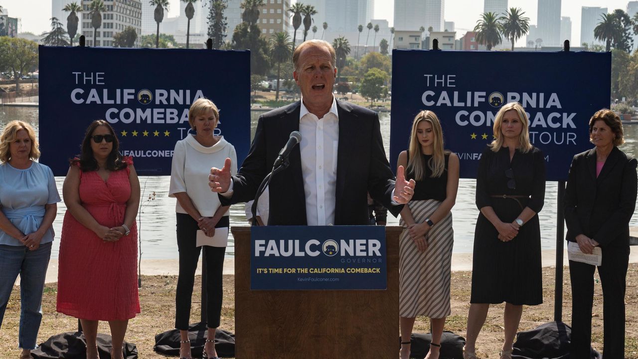 California gubernatorial candidate and former San Diego mayor Kevin Faulconer, center, speaks to the media at a campaign stop to promote his "women's empowerment plan" at MacArthur Park in Los Angeles Monday, Aug. 30, 2021.