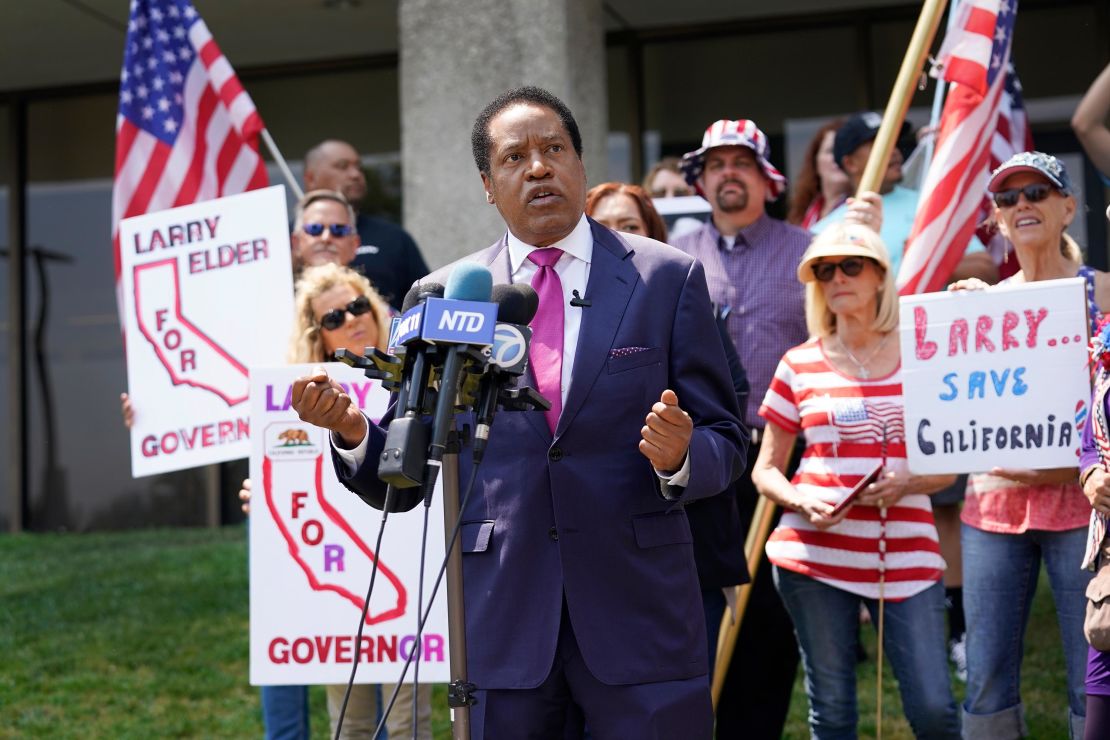 In this July 14, 2021, file photo, radio talk show host Larry Elder speaks to supporters during a campaign stop in Norwalk, California. 