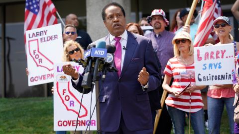 In this July 14, 2021, file photo, radio talk show host Larry Elder speaks to supporters during a campaign stop in Norwalk, California. 