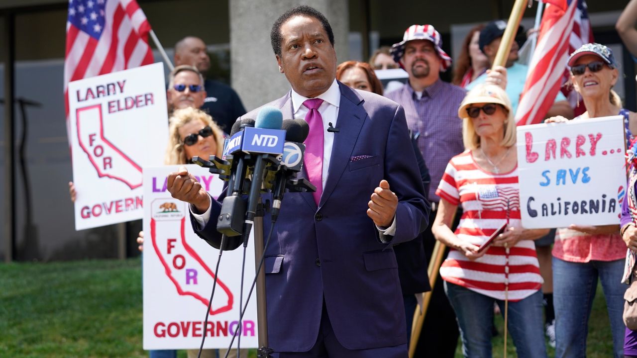 In this July 14, 2021, file photo, radio talk show host Larry Elder speaks to supporters during a campaign stop in Norwalk, California.