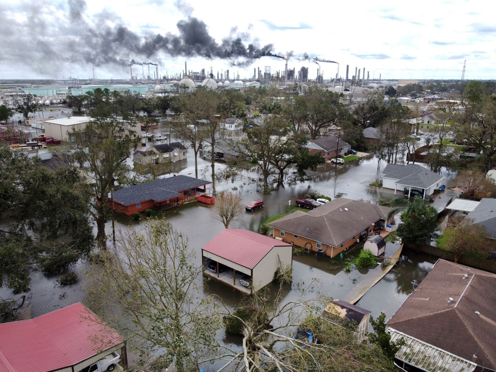 Homes near Norco are surrounded by floodwaters on August 30.