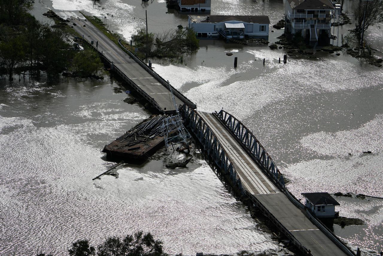 A barge damages a bridge connecting Lafitte and Jean Lafitte, Louisiana, on August 30.