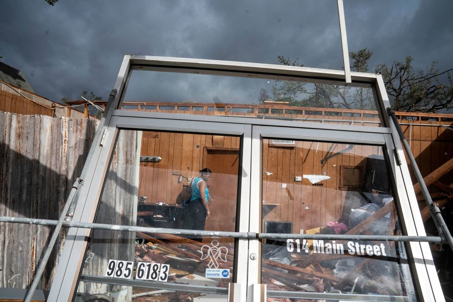 Marquita Jenkins stands in the ruins of her hair salon in LaPlace on August 30.