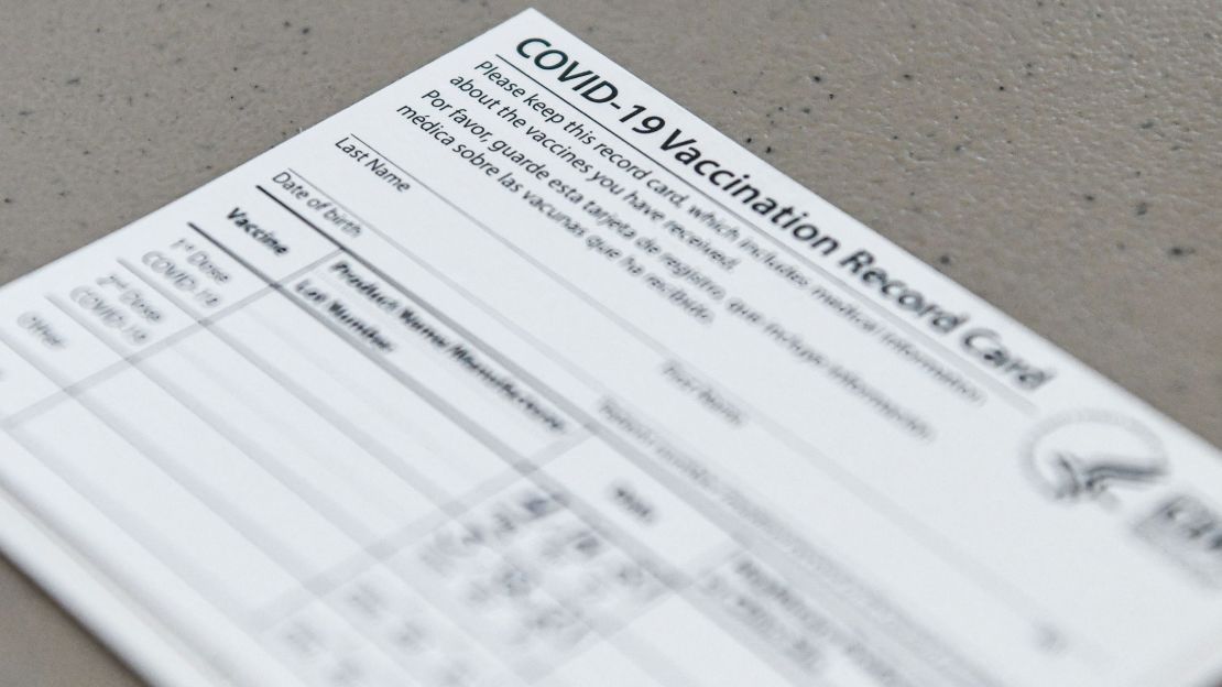 A Covid-19 vaccine record card is seen at Florida Memorial University Vaccination Site in Miami Gardens, Florida, on April 14, 2021.