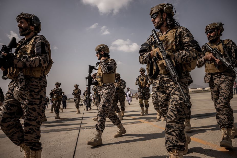 Heavily armed Taliban fighters are seen at the airport in Kabul on August 31.