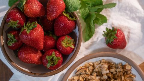 Look for bright red strawberries with fresh green caps. Keep the fruit dry and refrigerated until prep.