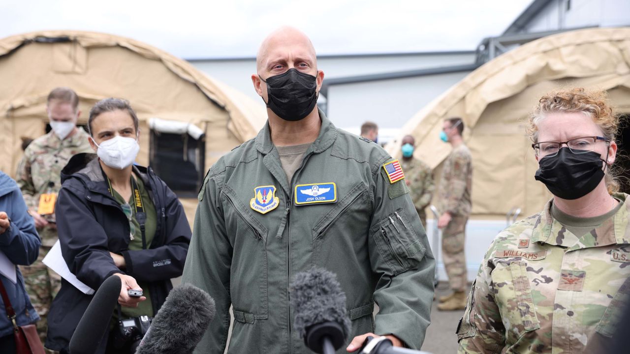 Joshua Olson, commander of the 86th Airlift Wing and installation commander at Ramstein Air Base, speaks with the media on August 26 in Ramstein-Miesenbach, Germany.
