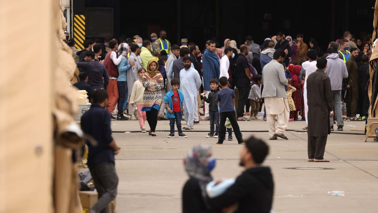 Evacuees from Afghanistan are seen at a temporary emergency shelter at the Ramstein Air Base on August 26.