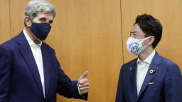 US climate envoy John Kerry (L) meets with Japan's Minister of the Environment Shinjiro Koizumi (R) at the offices of the Ministry of the Environment in Tokyo on August 31, 2021. (Photo by Koji Sasahara / POOL / AFP) (Photo by KOJI SASAHARA/POOL/AFP via Getty Images)