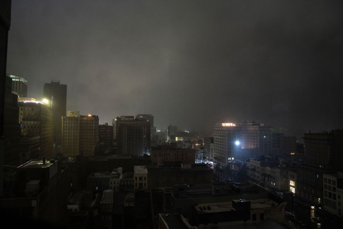 The downtown skyline in New Orleans is largely shrouded in darkness on Sunday night. The lights that are on are powered by generators. 