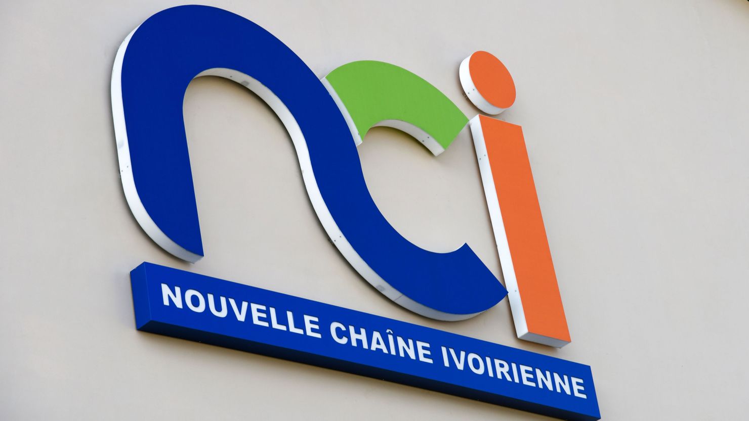 This picture taken on December 13, 2019, shows the logo of the Nouvelle Chaine Ivoirienne (New Ivorian channel) in Abidjan, Ivory Coast. 