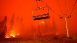 TWIN BRIDGES, CALIFORNIA - AUGUST 30: A chairlift at Sierra-at Tahoe ski resort sits idle as the Caldor Fire moves through the area on August 30, 2021 in Twin Bridges, California. The Caldor Fire has burned over 165,000 acres, destroyed over 650 structures and is currently 13 percent contained. (Photo by Justin Sullivan/Getty Images)