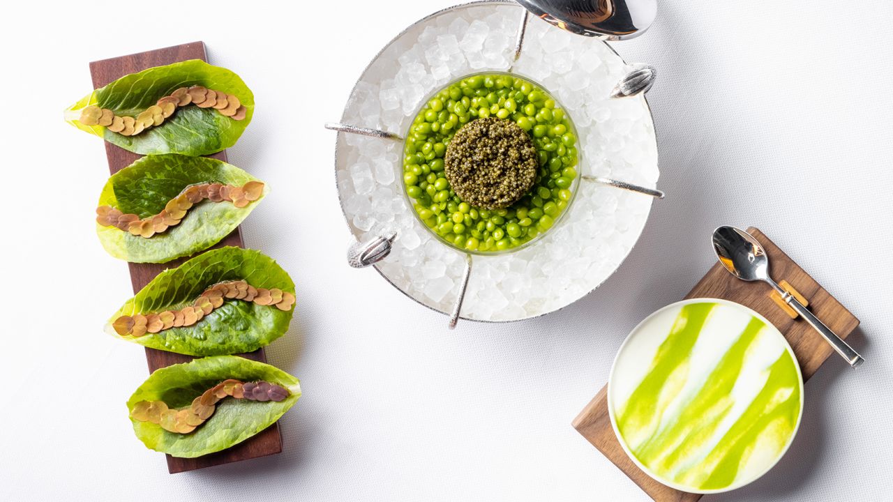 One of the items on the new vegan Eleven Madison Park menu: tonburi with pea cream and baby lettuce.