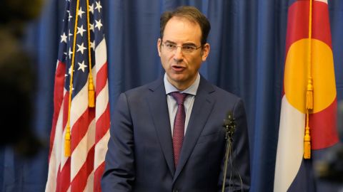 Colorado Attorney General Phil Weiser talks about a grand jury investigation into the death of Elijah McClain during a news conference on Wednesday in Denver.