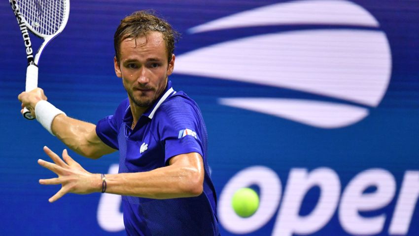 Russia's Daniil Medvedev hits a return to France's Richard Gasquet during their 2021 US Open Tennis tournament men's singles first round match at the USTA Billie Jean King National Tennis Center in New York, on August 30, 2021. (Photo by Ed JONES / AFP) (Photo by ED JONES/AFP via Getty Images)