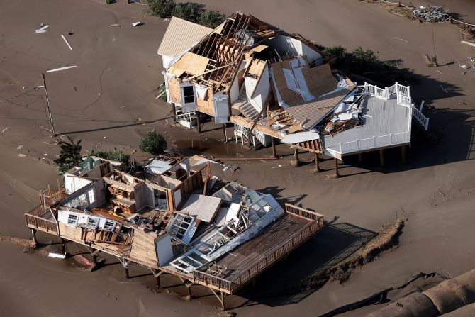 This aerial photo shows the hurricane aftermath in Grand Isle, Louisiana, on August 31. Grand Isle, Louisiana's last remaining inhabited barrier island at the southern tip of the state, <a href="index.php?page=&url=https%3A%2F%2Fwww.cnn.com%2F2021%2F09%2F01%2Fus%2Fgrand-isle-louisiana-ida%2Findex.html" target="_blank">bore the brunt of the Category 4 hurricane.</a>