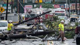 ANNAPOLIS, MD - SEPTEMBER 01: Comcast utility workers survey the damage from a tornado on West Street in Annapolis, Maryland on September 1, 2021. The r