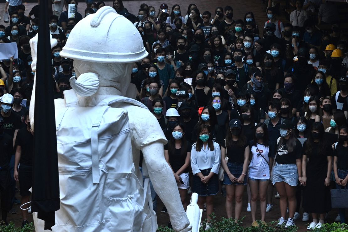 Masked students attend a rally at the University of Hong Kong on September 9, 2019.