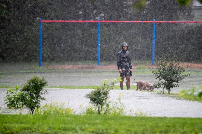 A man walks his dog in Camp Hill, Pennsylvania, on September 1.