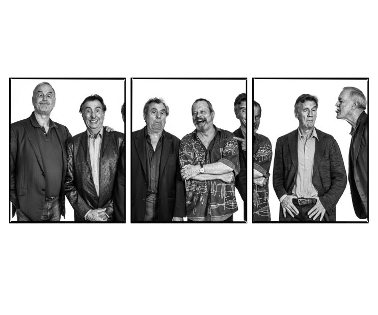 Monty Python stars John Cleese, Eric Idle, Terry Jones, Michael Palin, Terry Gilliam posing together.