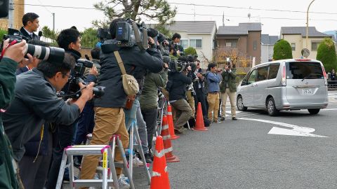 A car carrying Chisako Kakehi leaves the police station on November 20, 2014, in Muko, Japan. 
