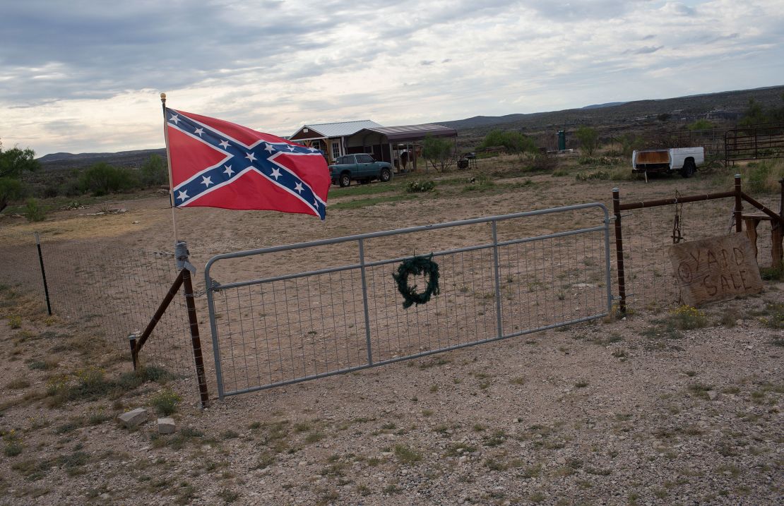 A Confederate flag flies outside of a home on April 17, 2021, in Langtry, Texas.