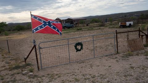 A Confederate flag flies outside of a home on April 17, 2021, in Langtry, Texas.