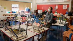 NEW YORK, NEW YORK - SEPTEMBER 02: Laura Lai, a teacher at Yung Wing School P.S. 124, surveys her classroom in preparation for the upcoming start of school on September 02, 2021 in New York City. All NYC public school students will return to in-person classes this month for the 2021-2022 school year, except for when COVID-positive kids must quarantine at home. Surveillance testing will be conducted every other week in each school building and will randomly test 10 percent of all students whose parents have consented. (Photo by Michael Loccisano/Getty Images)