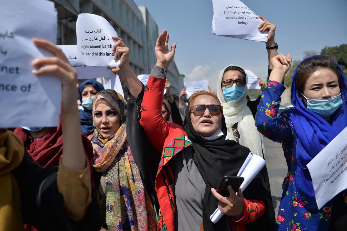 Afghan women take part in a protest march for their rights under the Taliban rule in the downtown area of Kabul on Friday.