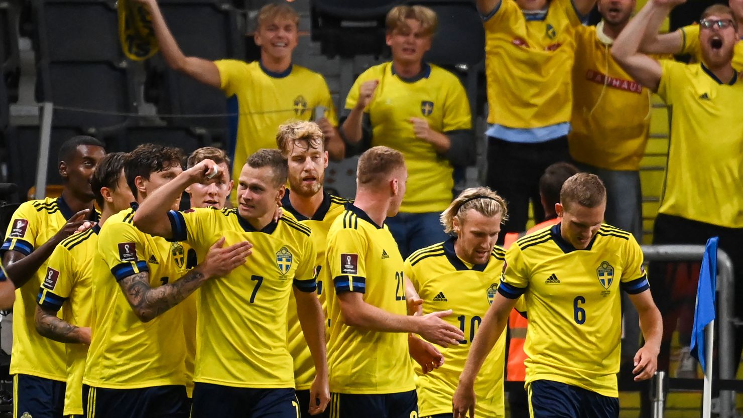 Sweden's players celebrate taking the lead against Spain. 