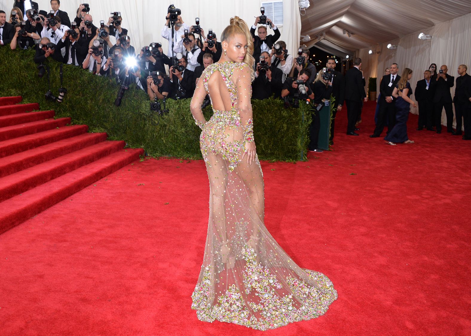 Beyoncé's electrifying 2015 Met Gala look was another Givenchy creation. Candy-colored rhinestones pooled at the train of the singer's sheer gown. The custom dress was designed by Riccardo Tisci and enhanced by Lorraine Schwartz's jewels.