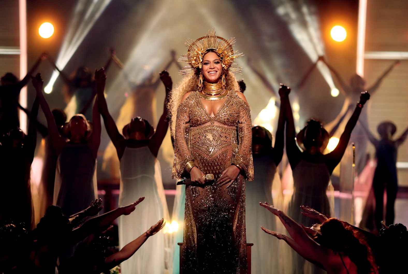 Beyoncé's pregnancy in 2017 became a defining feature of her sun goddess-inspired outfit for the 59th Grammy Awards. Peter Dundas designed the embellished garment with baby bump in mind, drawing on African iconography, as well as Gustav Klimt's decorative Art Nouveau paintings to create the gilded garb.