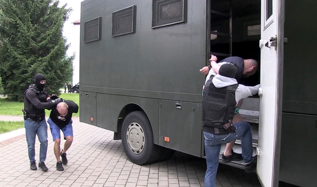 Belarusian authorities first believed the arrest of the Russians prevented them interfering in the country's presidential elections.