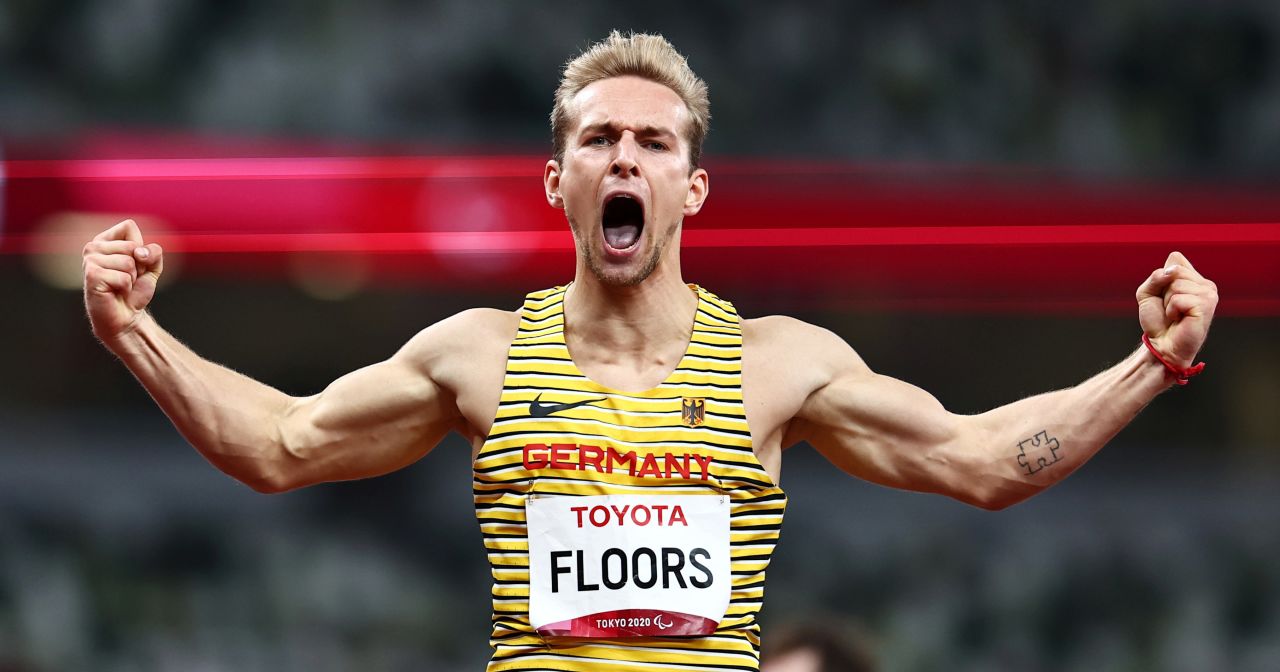 Germany's Johannes Floors celebrates after winning gold in a 400-meter race on Friday, September 3.