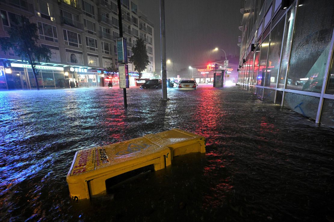 Stalled cars caught in a flash flood near Queens Boulevard in the New York City borough of Queens on September 1, 2021