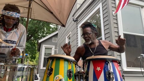 Norberto Gomez Mendez plays the drums that half show support for the Green Bay Packers and the other half for Cuba.